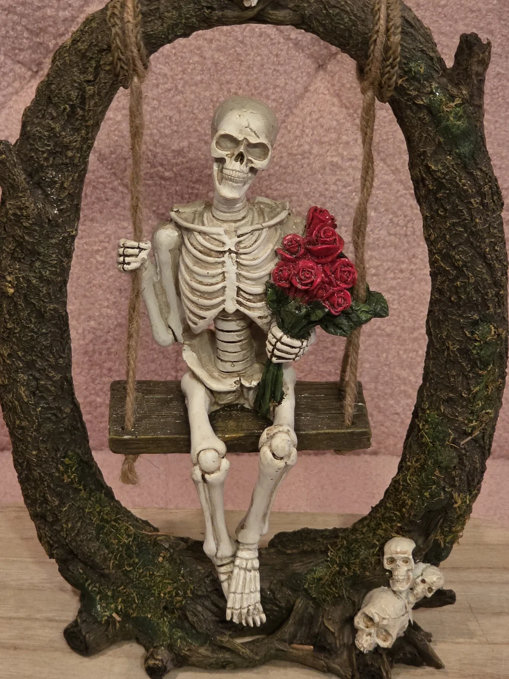 Skeleton on Swing Figurine with Red Roses